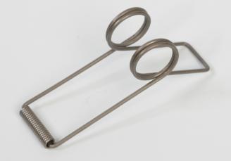 Scoop fjeder for aftapning